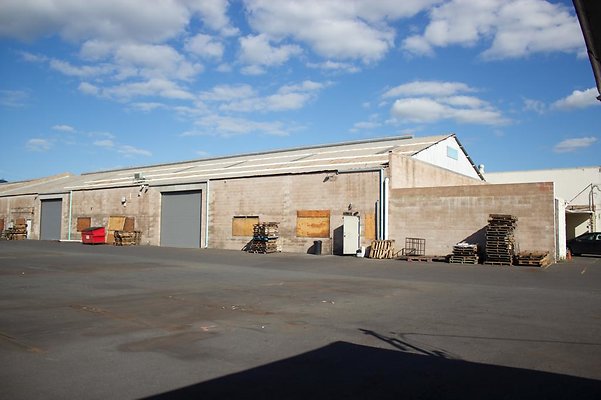 exterior large warehouse POV from smaller warehouse exterior large warehouse POV from smaller warehouse